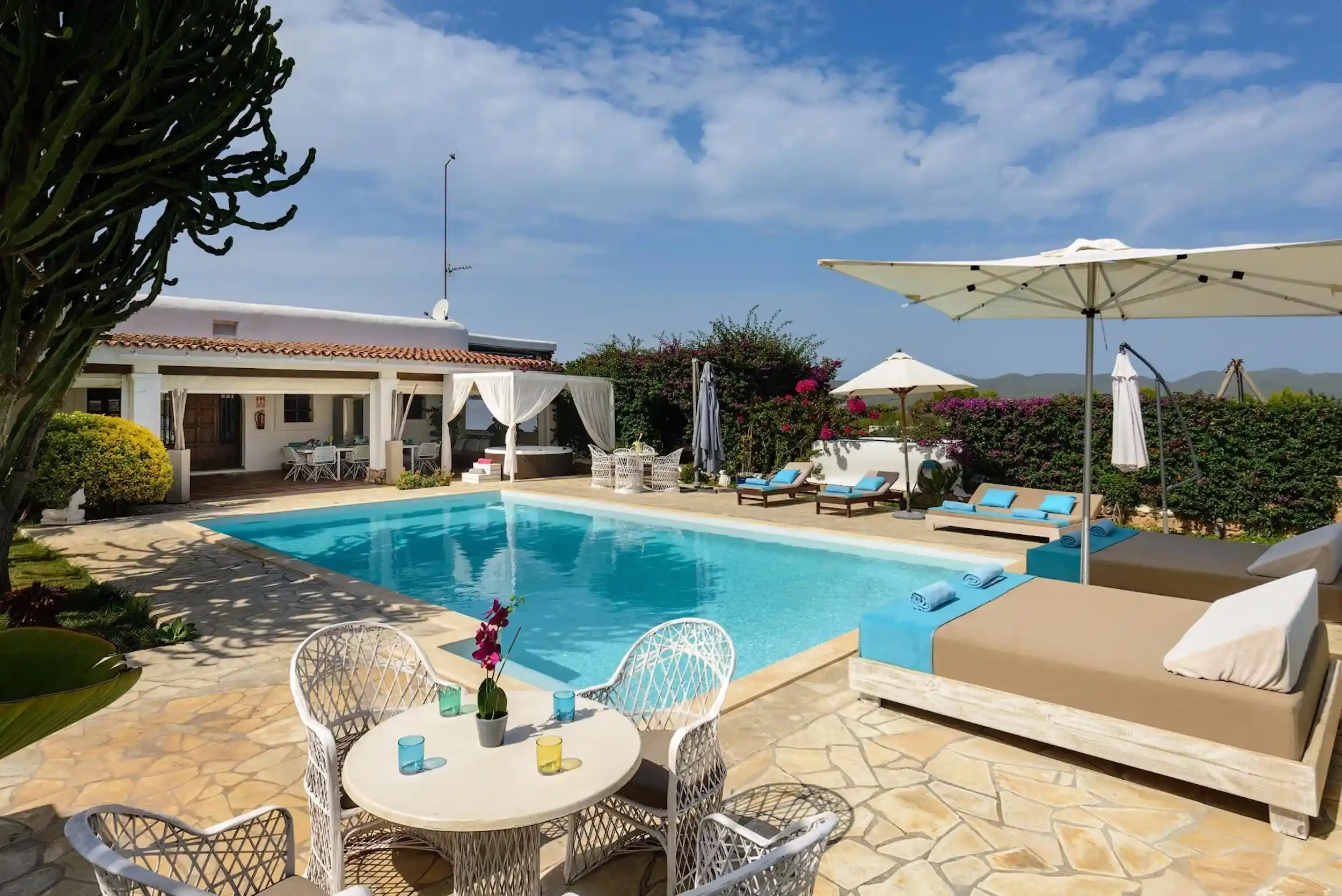 Private villa with a pool and shaded lounge