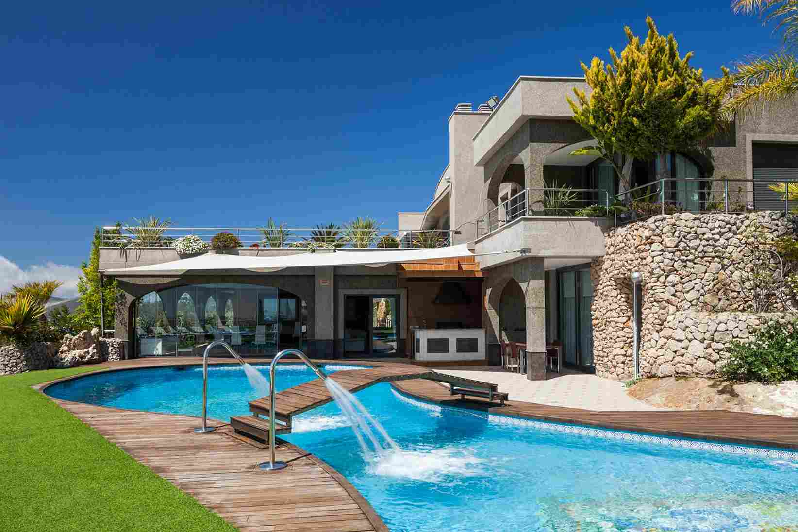 Luxury villa in Ibiza with a large swimming pool.
