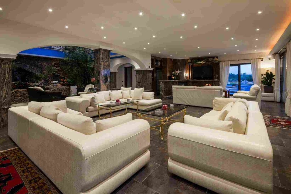 Large group villas in ibiza, modern interior with sofas of luxurious villa in Ibiza.
