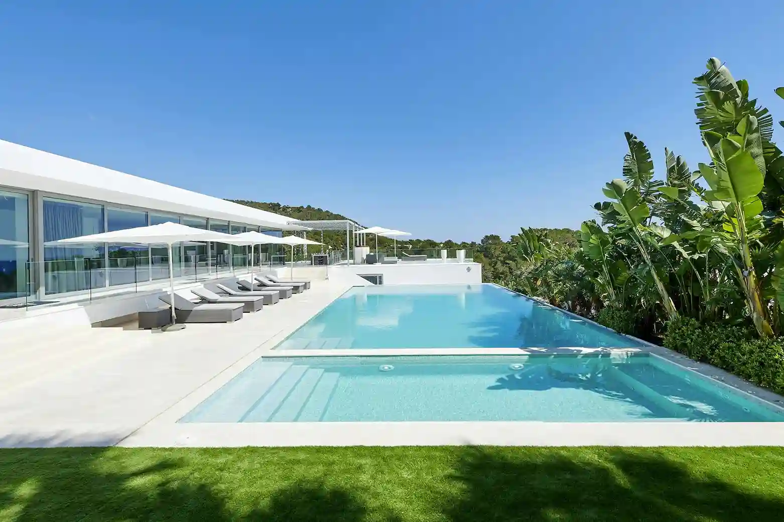 Luxury villa in Ibiza with a large swimming pool.