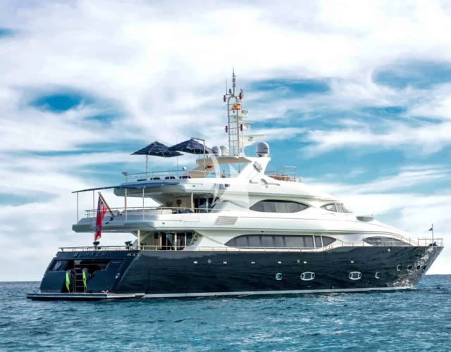 The CRN Bunker yacht cruising on open waters, showcasing its sleek design and elegant profile