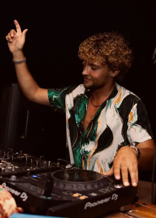 DJ Performing behind Pioneer CDJs