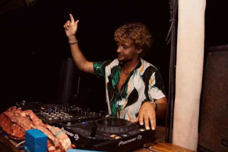 DJ Performing behind Pioneer CDJs
