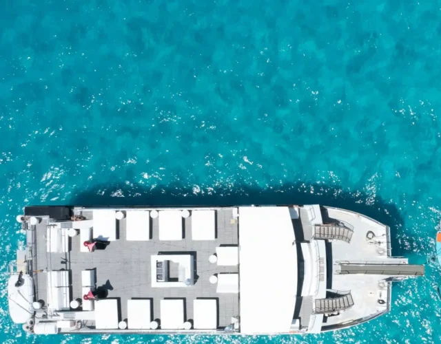 Floating event venue catamaran in ibiza sea from above