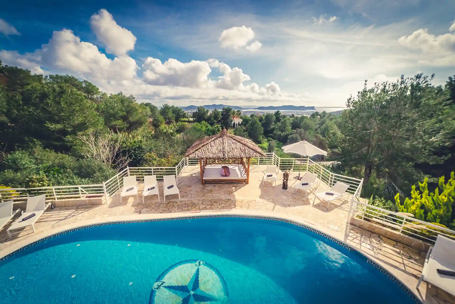 Beautiful distant sea view from villa terrace with pool