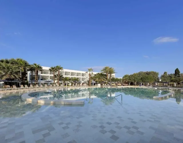Beautiful Lagoon style pool with hotel in background